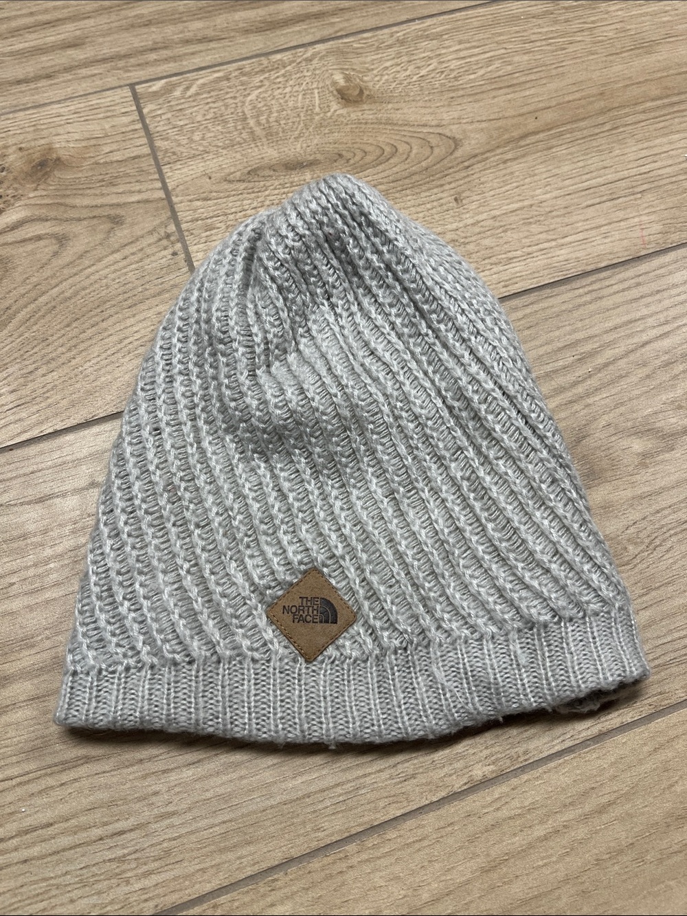 The North Face Light Gray Ribbed Knit Beanie with Logo Patch